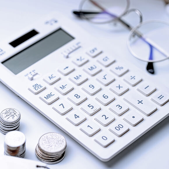 About Us Page First Image containing a Calculator in a White Background